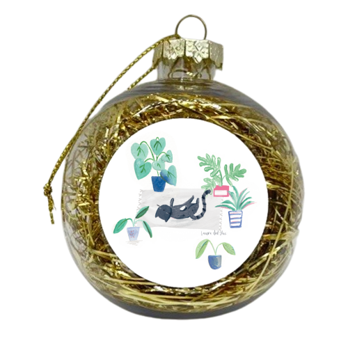 black cat lying on grey scandi rug - xmas bauble by lauradidthis