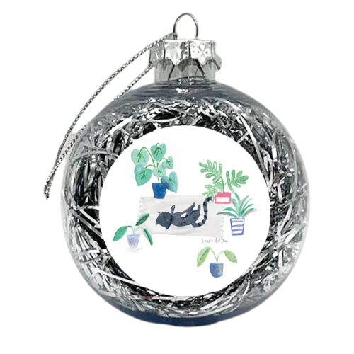 black cat lying on grey scandi rug - xmas bauble by lauradidthis