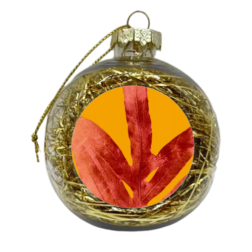 Green Fern on Red On Fire - xmas bauble by Alicia Noelle Jones