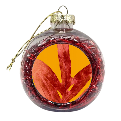 Green Fern on Red On Fire - xmas bauble by Alicia Noelle Jones