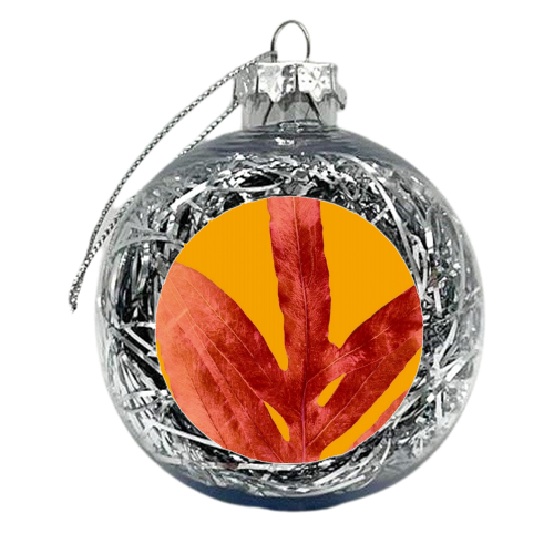 Green Fern on Red On Fire - xmas bauble by Alicia Noelle Jones