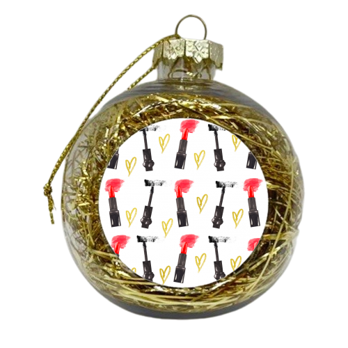 red lipstick and mascara - xmas bauble by Anastasios Konstantinidis