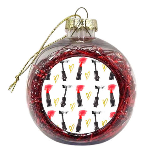 red lipstick and mascara - xmas bauble by Anastasios Konstantinidis