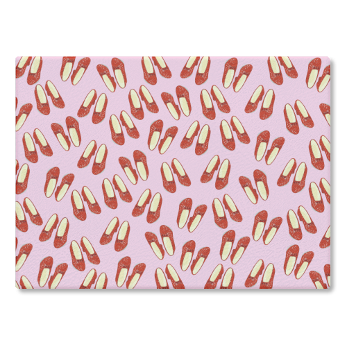 Ruby Red Slipper Pattern - glass chopping board by Adam Regester