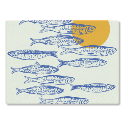 Sardines Sunset - glass chopping board by EZbie