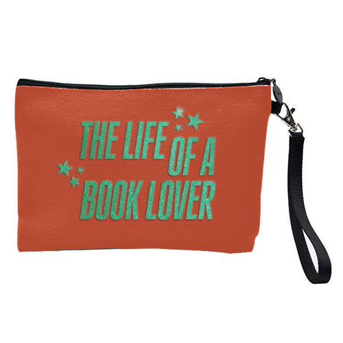Showgirl orange the life of a book lover typography reader - pretty makeup bag by The Girl Next Draw
