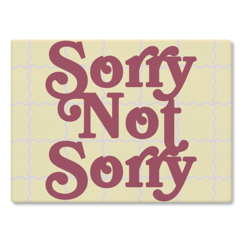 Sorry Not Sorry - glass chopping board by Daniela di Niro