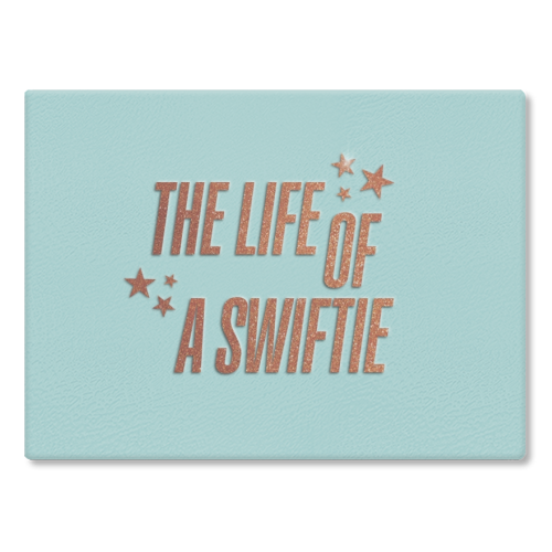 Showgirl The Life Of A Swiftie typography print - glass chopping board by The Girl Next Draw