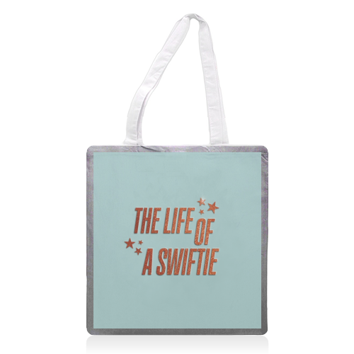 Showgirl The Life Of A Swiftie typography print - printed canvas tote bag by The Girl Next Draw