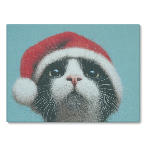 Warm Christmas hat - glass chopping board by DejaReve